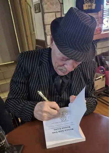 James Marcacci signing his book, Benld and the Booze Gang